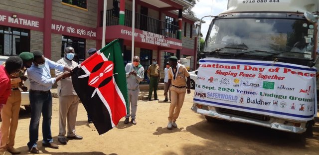 Commissioner Dr. Danvas Makori flagging off a peace caravan ahead of the International Day of Peace Celebrations in Kibera on 18th September, 2020.